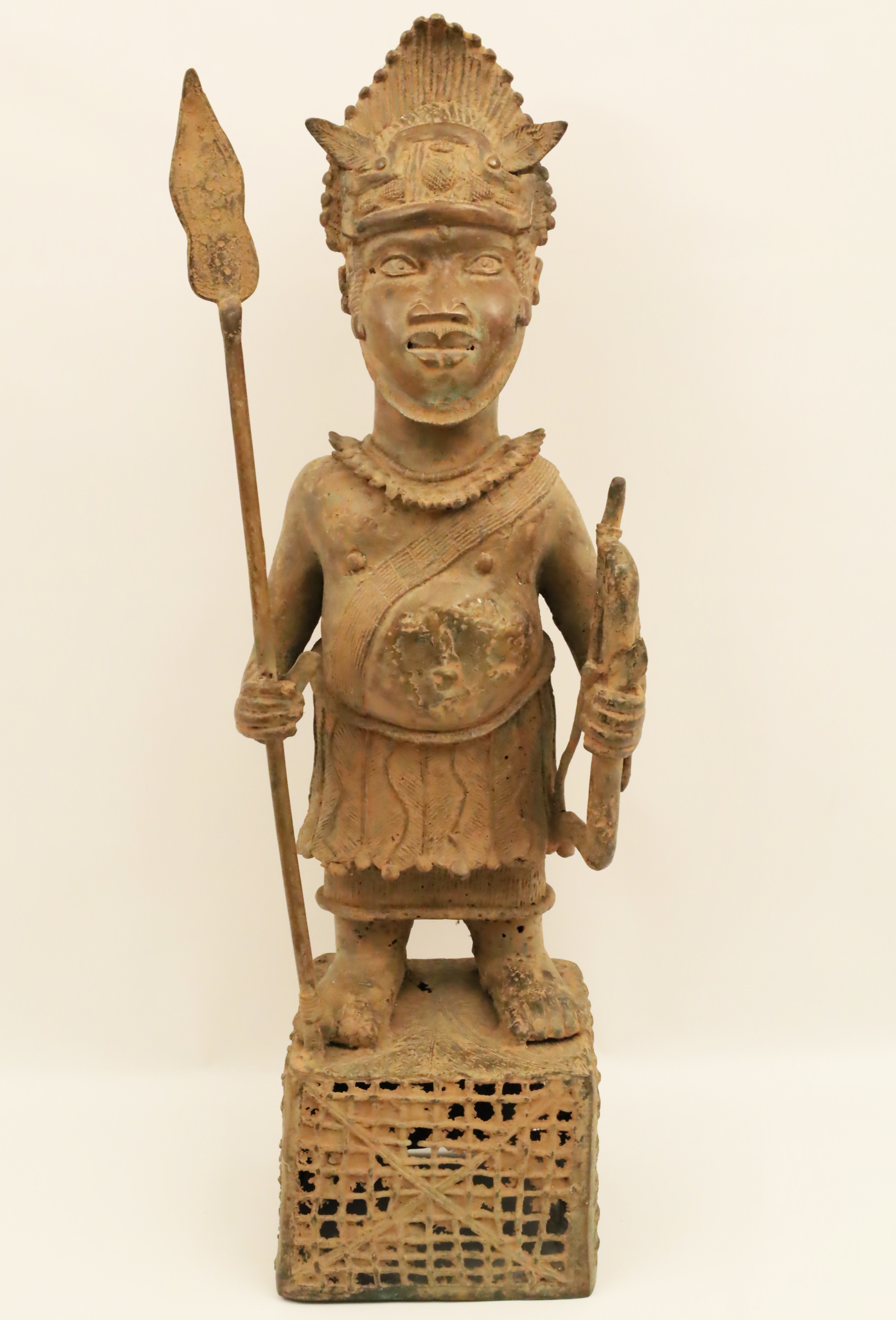 Appraisal: BRONZE BENIN WARRIOR Large African bronze sculpture of a Benin