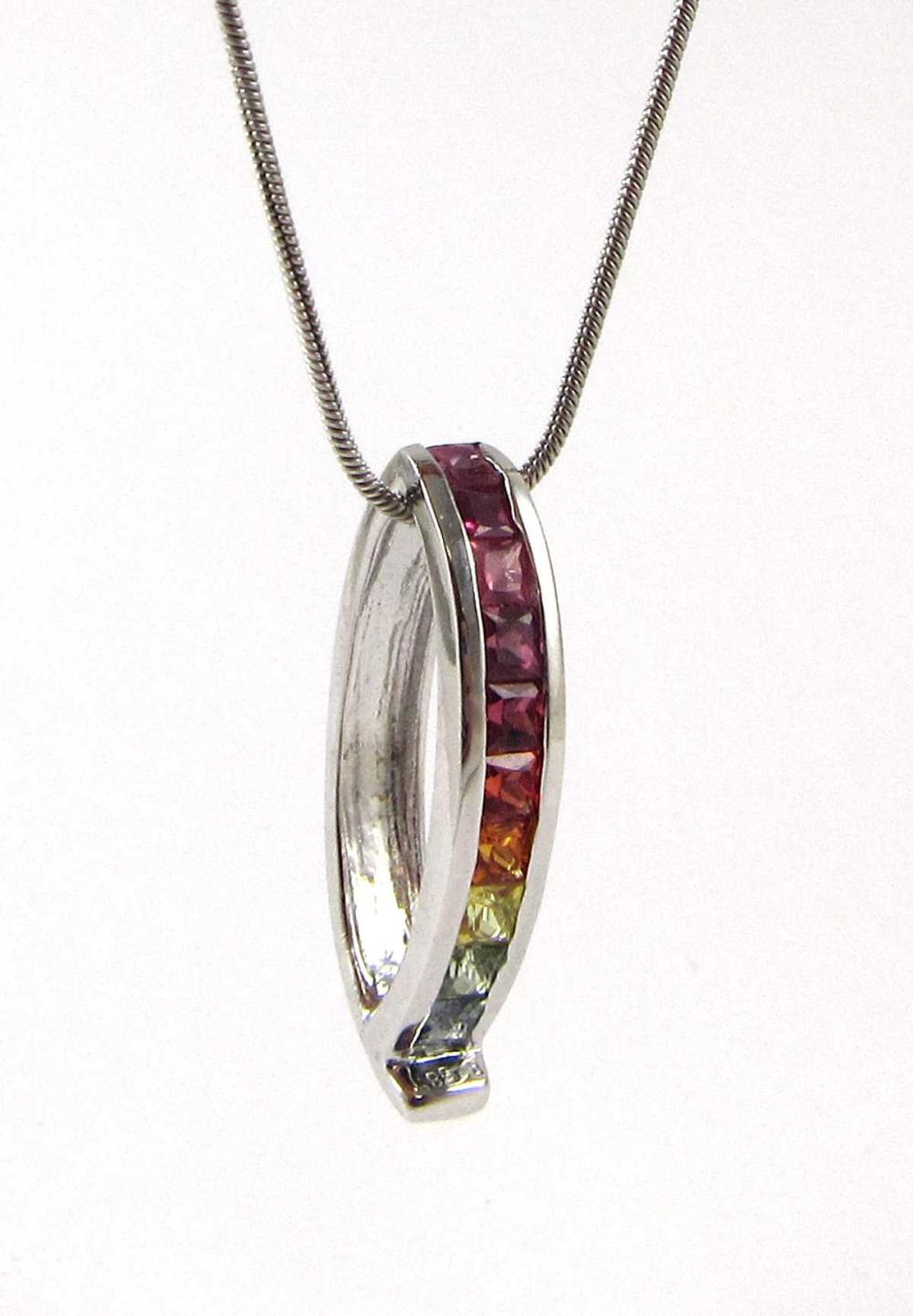 Appraisal: RAINBOW SAPPHIRE PENDANT NECKLACE with a - platinum snake chain