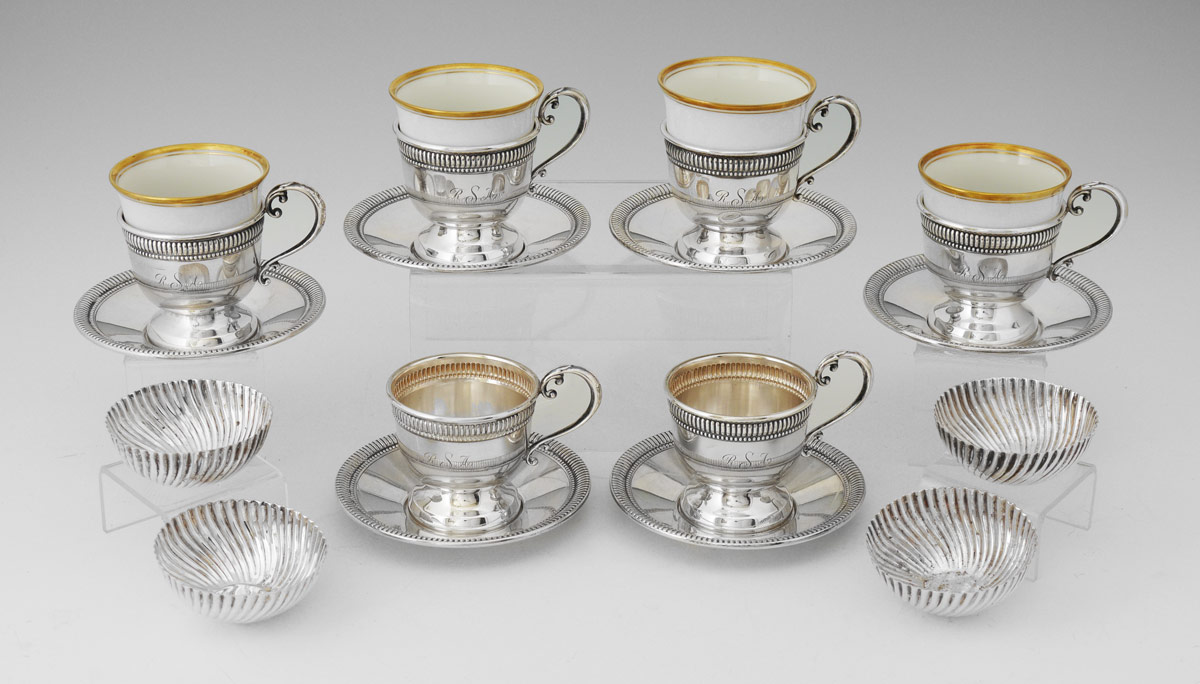 Appraisal: CARTIER STERLING DEMITASSE SET monogrammed cups '' h with underplates