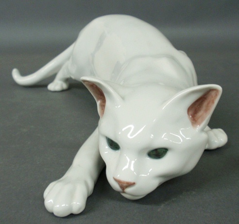 Appraisal: - White porcelain Royal Copenhagen cat with green eyes h