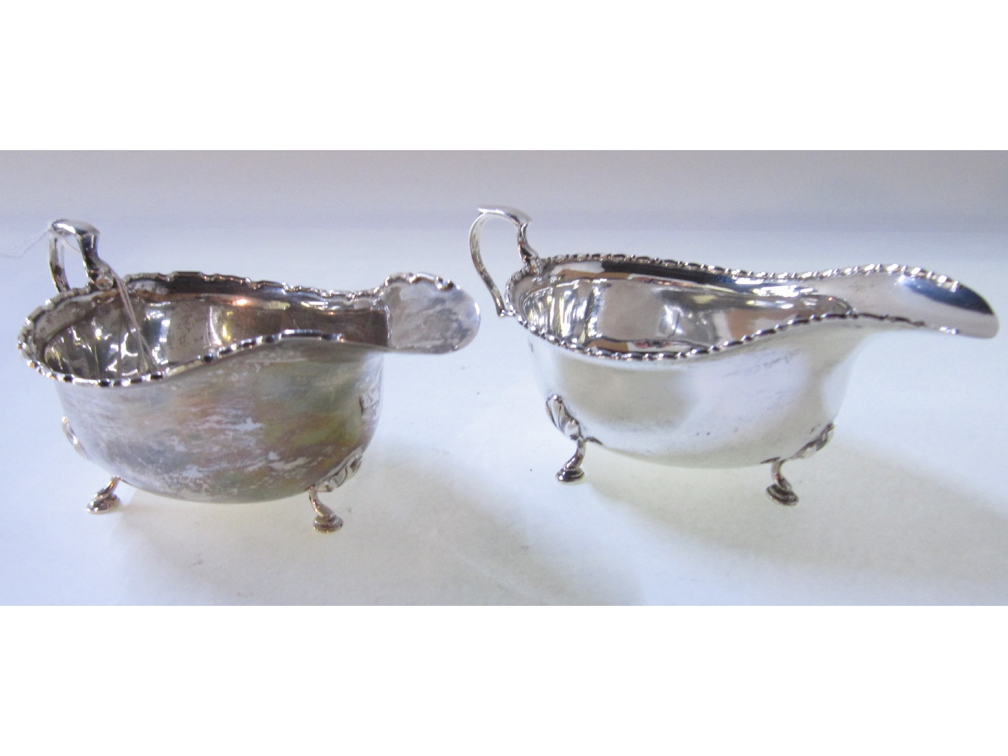 Appraisal: A lot comprising two silver sauceboats Birmingham