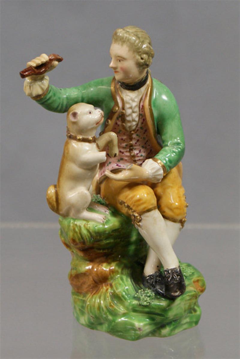 Appraisal: English porcelain figurine of a man with dog man missing