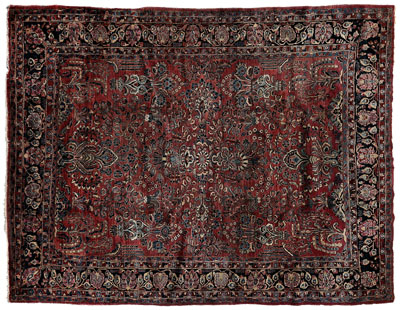 Appraisal: Sarouk rug typical floral and vase d