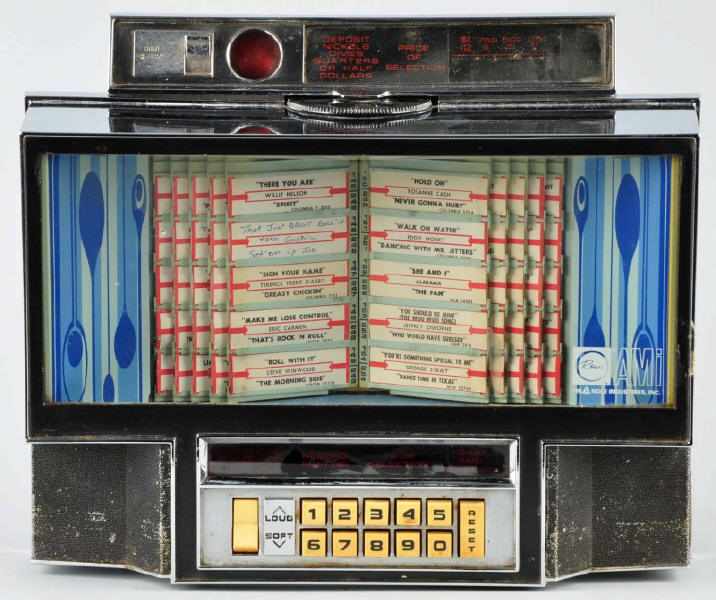 Appraisal: AMI Wall Mounted Coin-Operated Jukebox Description Accepts nickels dimes and