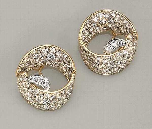 Appraisal: A pair of diamond platinum and eighteen karat gold earrings