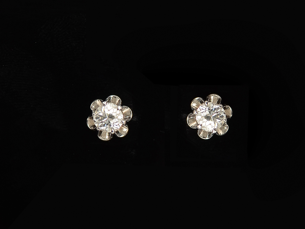 Appraisal: K CT BUTTER CUP EAR STUDS Old mine cut diamonds