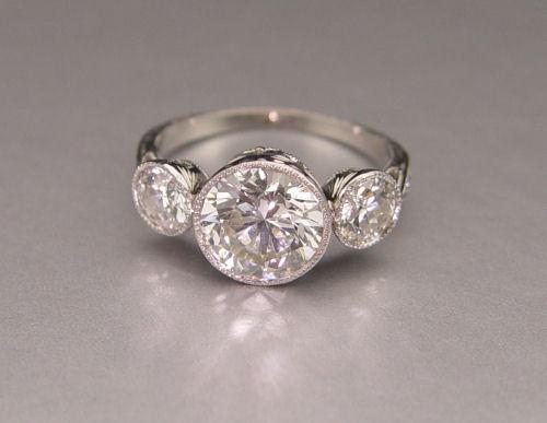 Appraisal: A STUNNING PLATINUM CT DIAMOND DECO REVIVAL RING Featuring an