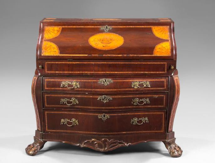 Appraisal: Continental Mahogany Bombe Bureau second quarter th century the curved