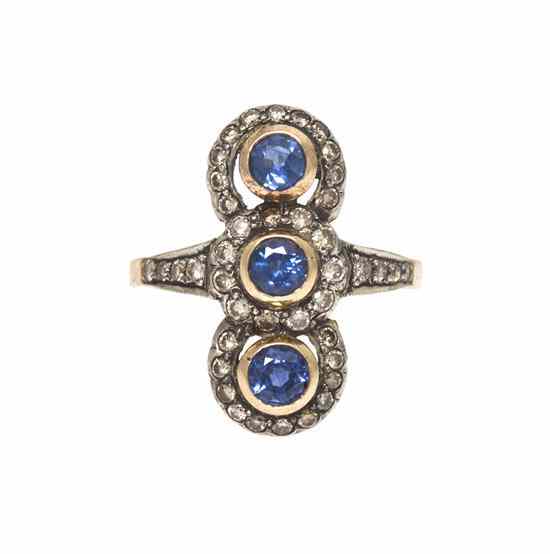 Appraisal: An Karat Yellow Gold Silver Sapphire and Diamond Ring containing