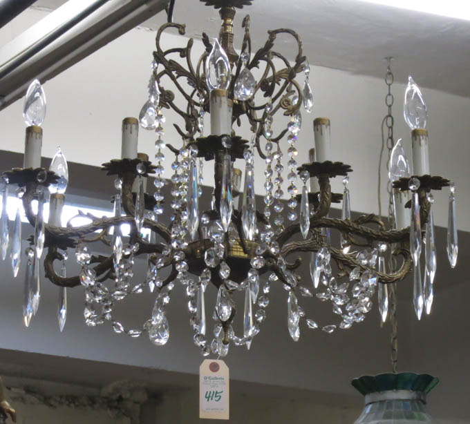 Appraisal: BRASS TWELVE-LIGHT CHANDELIER Louis XV styling having a small number