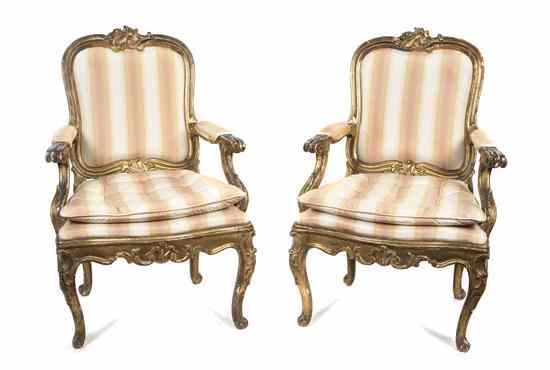 Appraisal: A Pair of Louis XV Style Giltwood Fauteuils each having