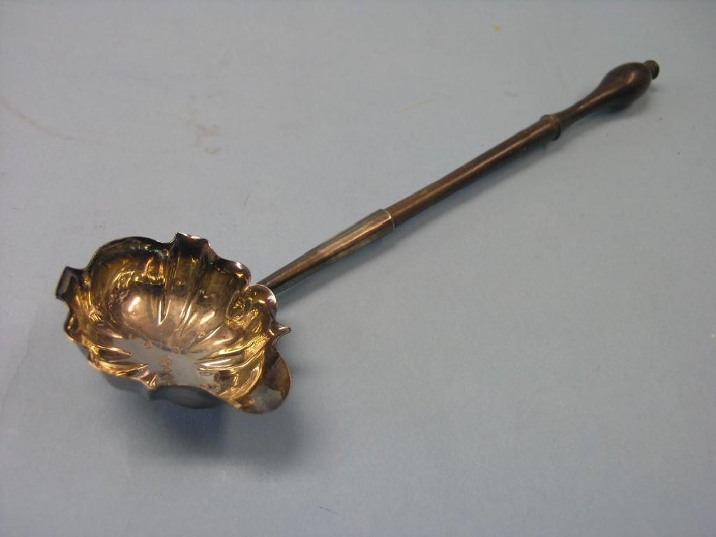 Appraisal: A mid th century silver toddy ladle with shaped bowl