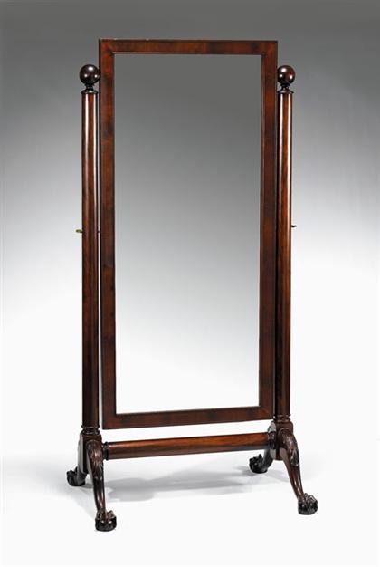 Appraisal: Classical mahogany cheval looking glass Canted rectangular mirror frame held