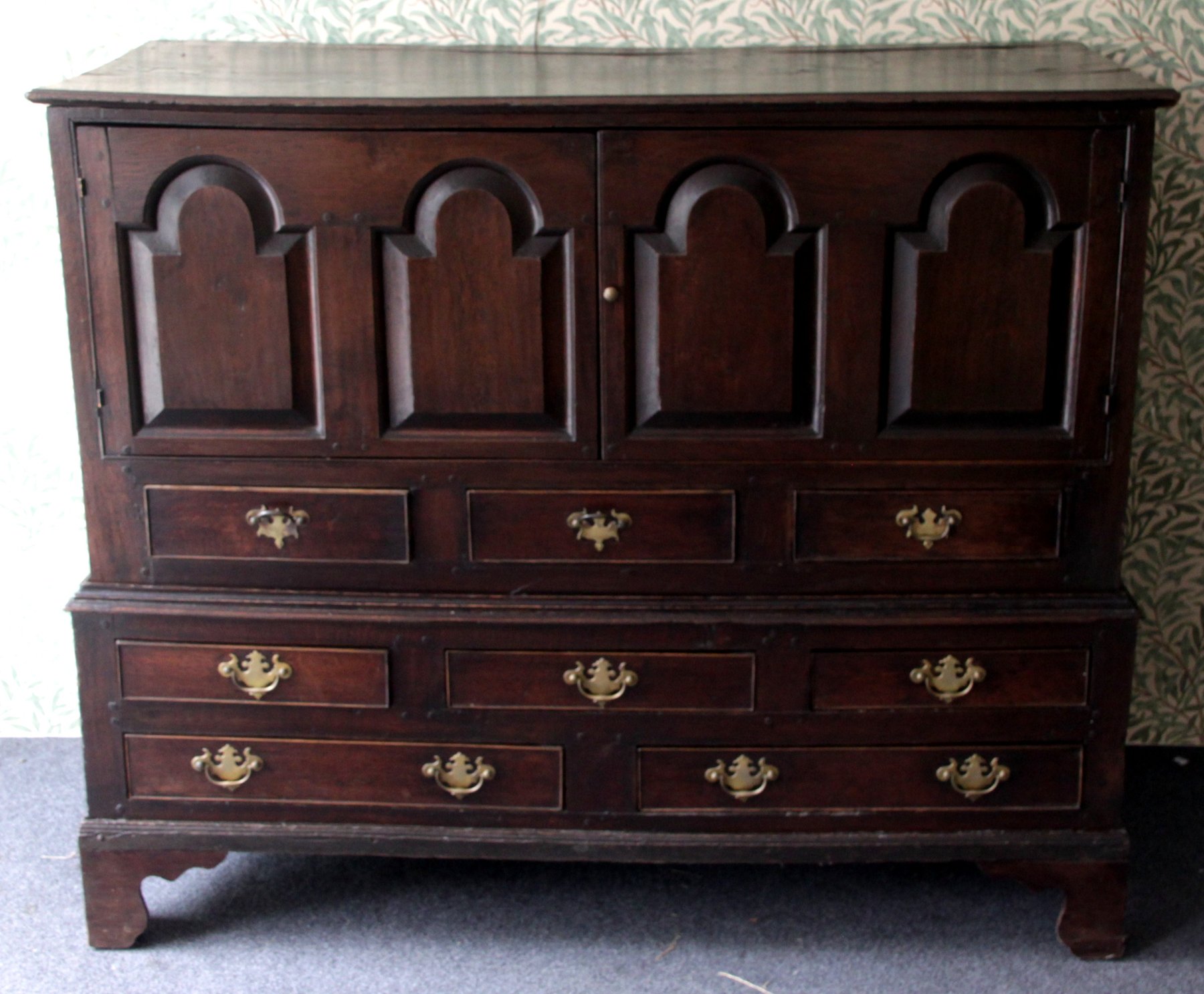 Appraisal: An th Century oak mule chest with four fielded arch