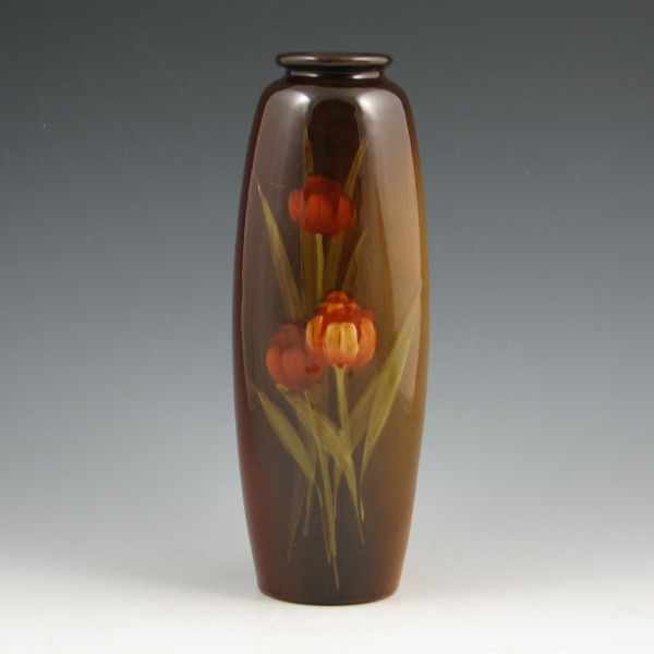 Appraisal: Owens Utopian standard glaze lamp vase with tulip decoration by