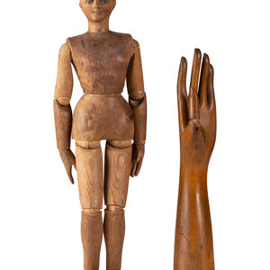 Appraisal: An Articulated Wooden Mannequin and a Carved Wooden Hand with