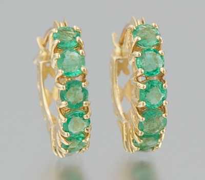 Appraisal: A Ladies' Emerald Earrings k yellow gold hoop earrings with