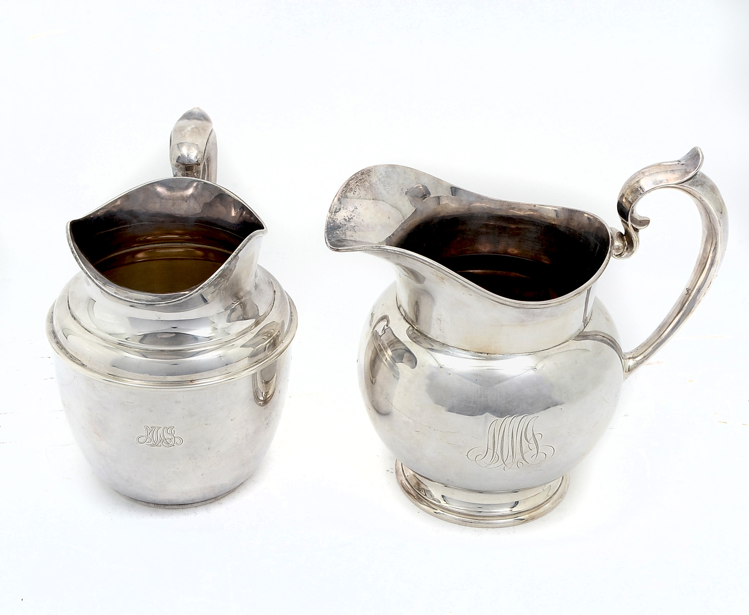 Appraisal: STERLING PITCHERS Approx Troy ounces Sterling Comprising - Tiffany Co