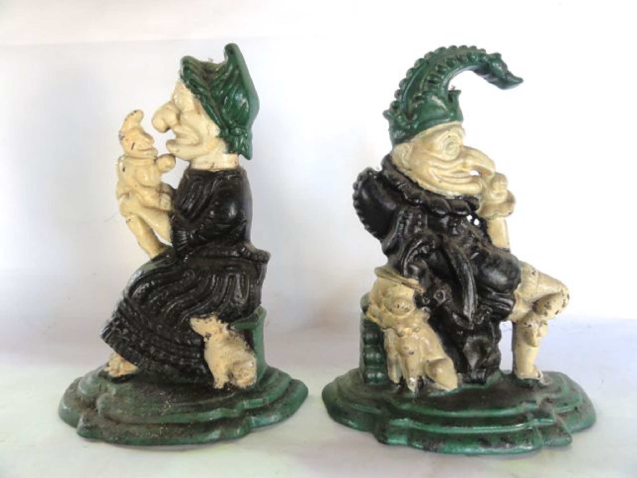 Appraisal: A pair of cast iron doorstops one in the form