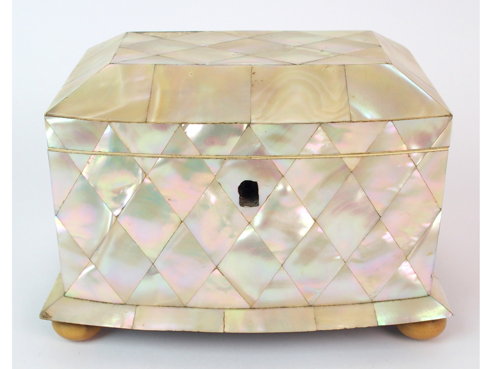 Appraisal: A Regency abalone shell tea caddythe hinged cover enclosing two