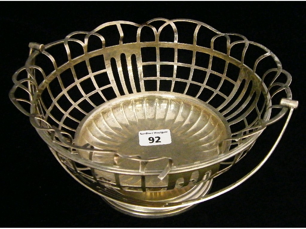 Appraisal: Edwardian swing handled bread basket with lunette pierced rim and