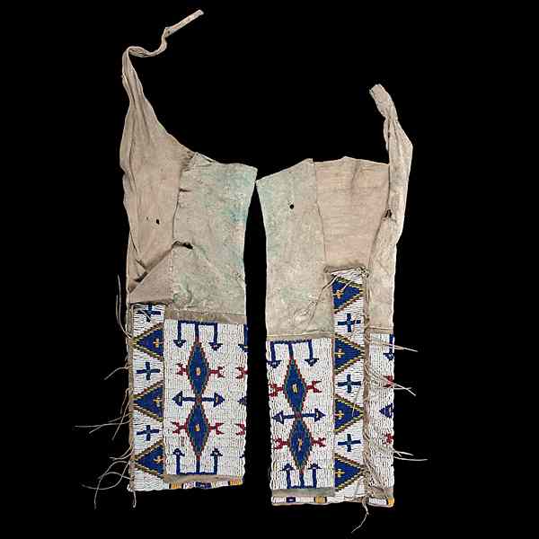 Appraisal: Sioux Beaded Hide Half Leggings sinew-sewn and beaded using colors