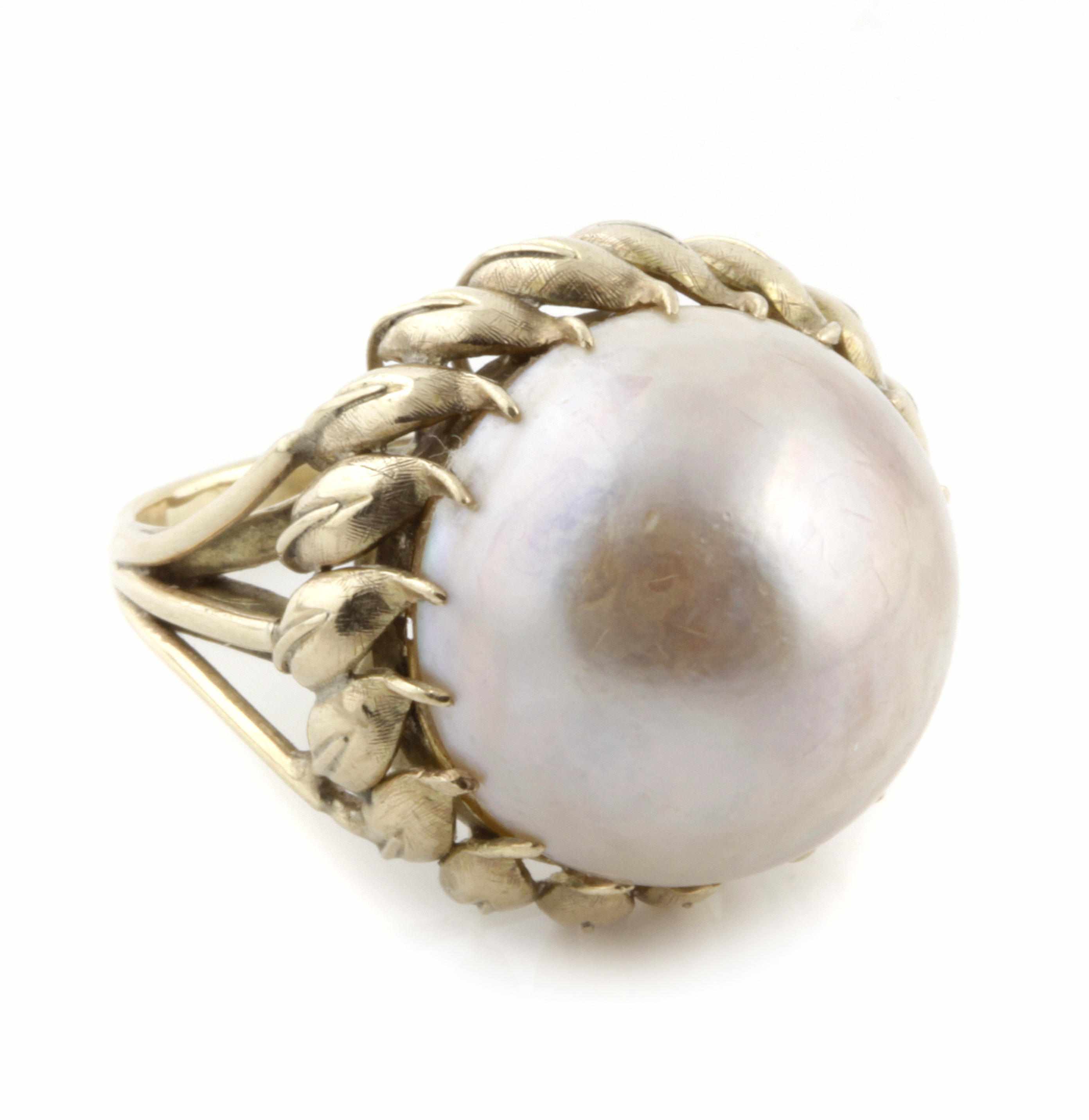 Appraisal: A mabe pearl and gold ring size in