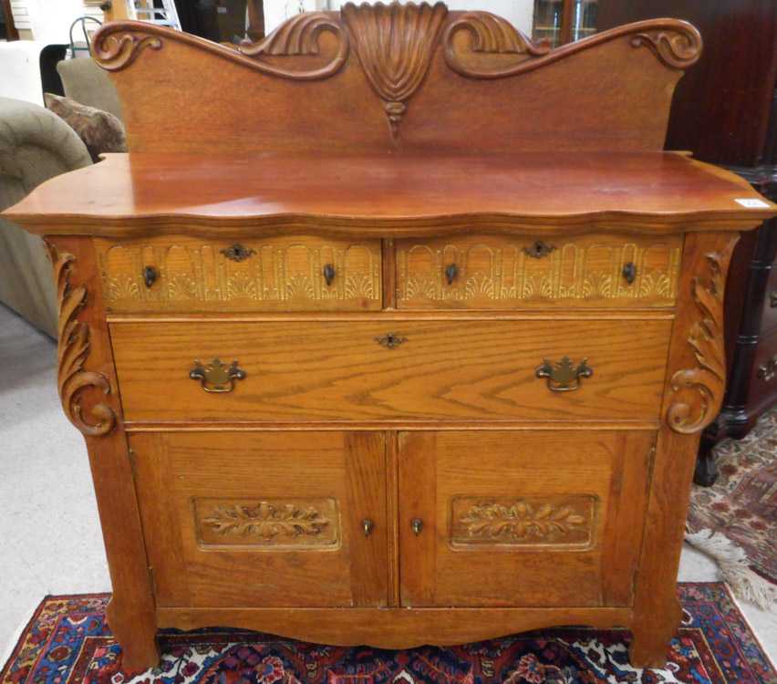 Appraisal: LATE VICTORIAN OAK BUFFET American c the front featuring three