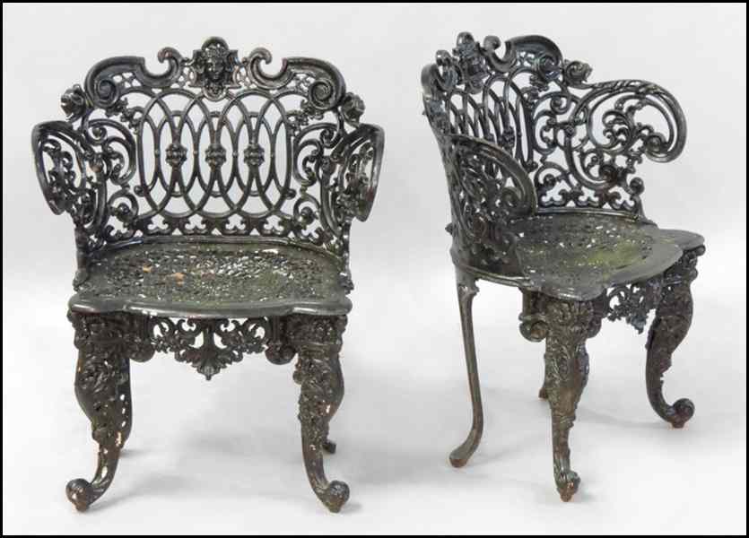 Appraisal: PAINTED CAST IRON SETTEE Together with a pair of armchairs