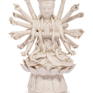 Appraisal: A Chinese Blanc-de-Chine Porcelain Figure of Multi-Armed Guanyin EARLY TH