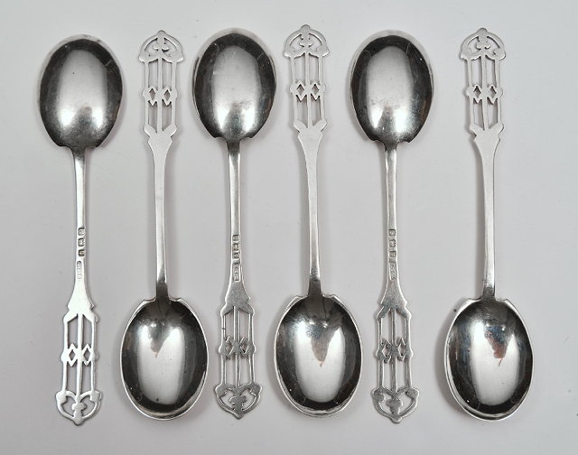 Appraisal: A SET OF ART NOUVEAU SILVER TEASPOONS with pierced stylised