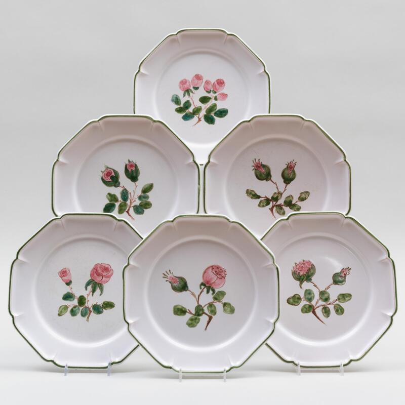 Appraisal: Set of Nine French Faience Plates Decorated with Flowers Painted