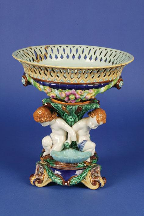 Appraisal: A LATE VICTORIAN WEDGWOOD MAJOLICA TABLE CENTRE PIECE the pierced