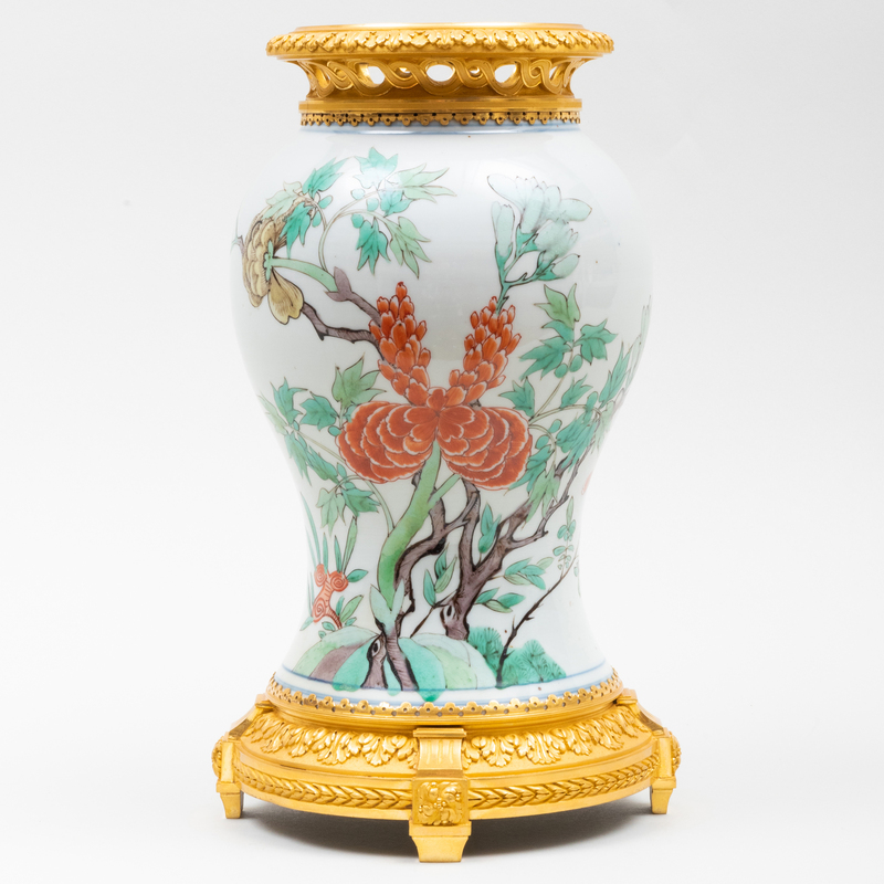 Appraisal: CHINESE FAMILLE ROSE PORCELAIN GILT-METAL-MOUNTED VASE Blue double circle mark