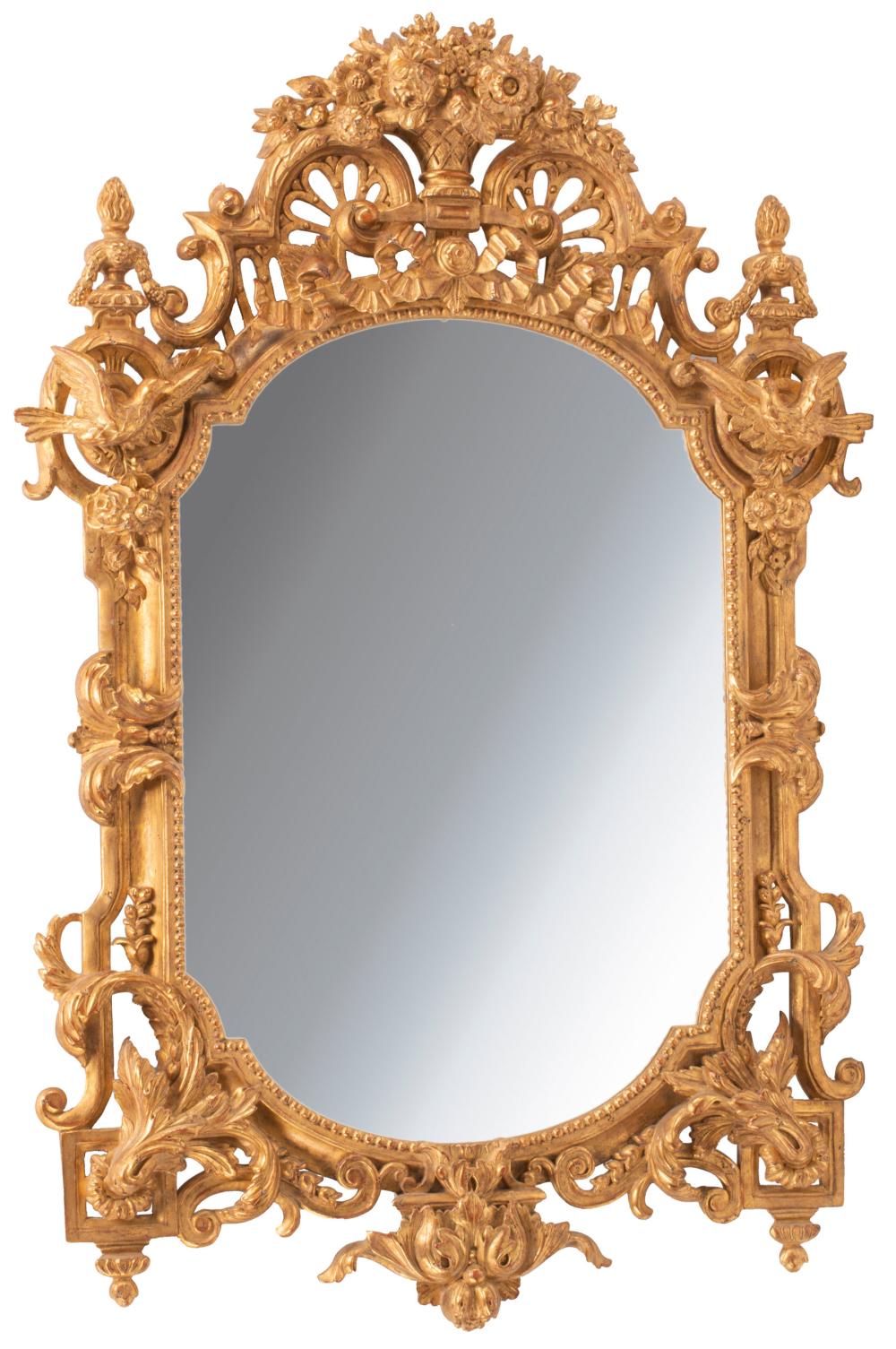 Appraisal: Regence-Style Giltwood Mirror surmounted by a floral basket torchere finials