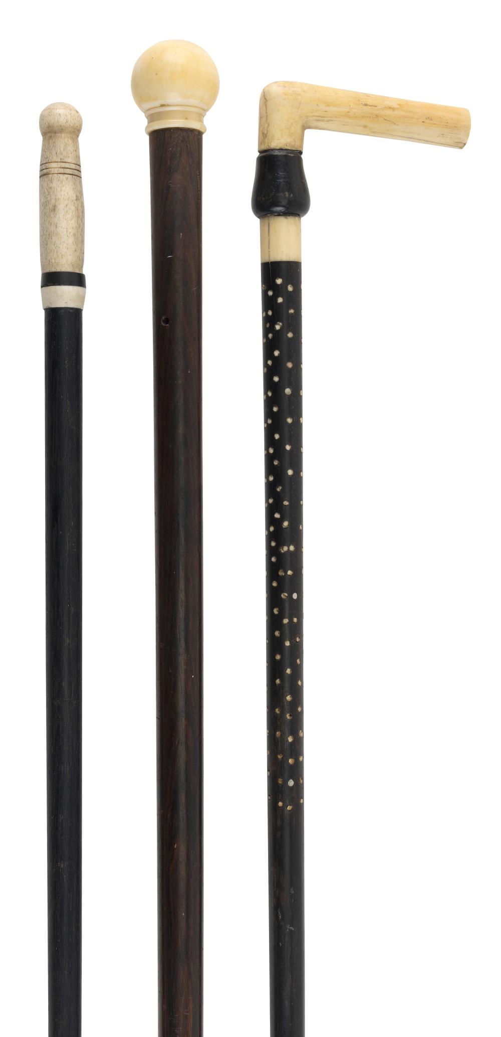 Appraisal: THREE CANES LATE TH CENTURY LENGTHS FROM TO THREE CANES