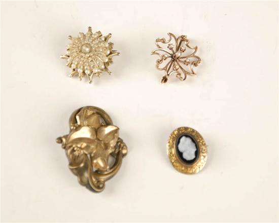 Appraisal: Four Antique Gold Filled Brooches a starburst design set with