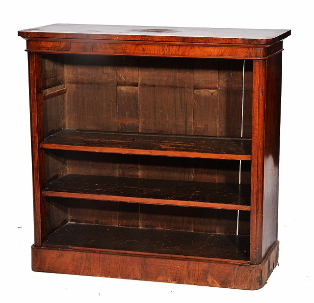 Appraisal: A VICTORIAN WALNUT OPEN BOOKCASE by Edwards Roberts fitted adjustable