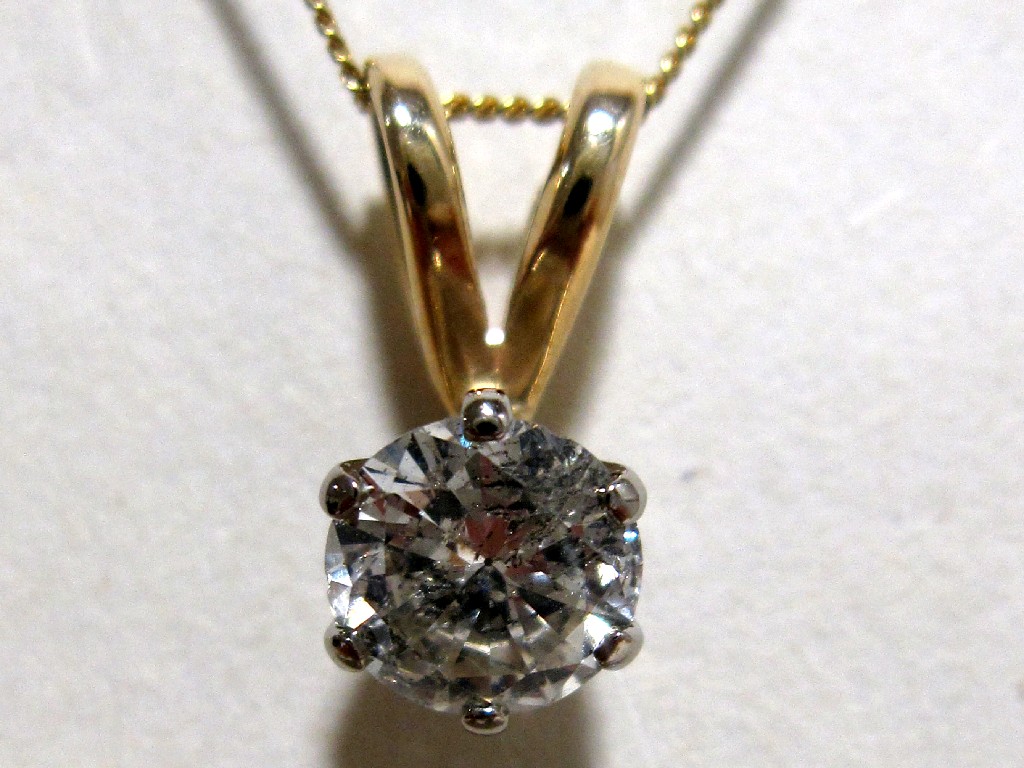 Appraisal: Diamond pendant in ct gold mount with brilliant cut diamond