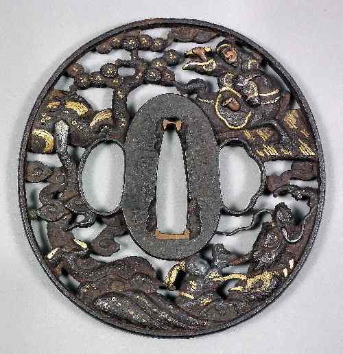 Appraisal: A Japanese iron tsuba Soten School of oval shape pierced