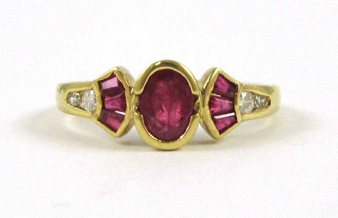 Appraisal: RUBY DIAMOND AND EIGHTEEN KARAT GOLD RING with three tapered