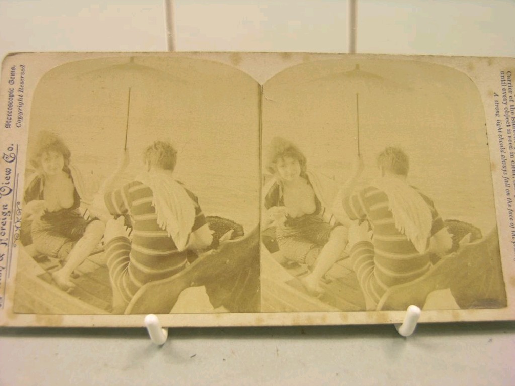 Appraisal: A small collection of Victorian stereoscopic slides including four risque