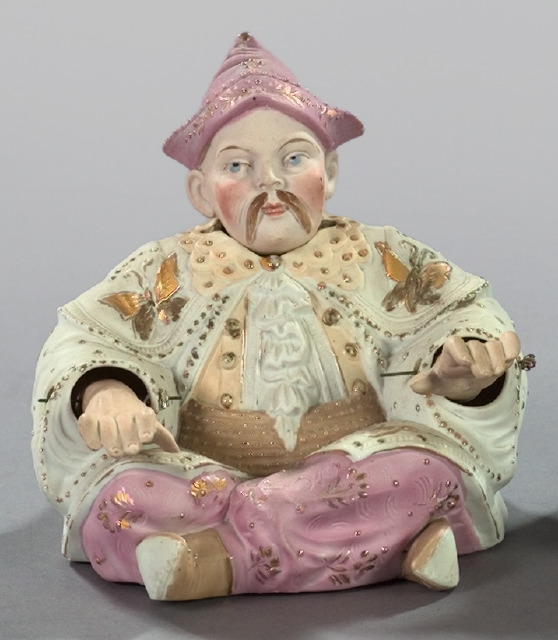 Appraisal: Germano-Bohemian Polychromed and Parcel-Gilt Porcelain Niddy-Noddy in the form of