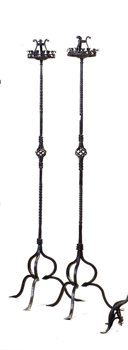 Appraisal: PAIR OF TWISTED WROUGHT-IRON TORCHERES EACH RAISED ON A SHAPED