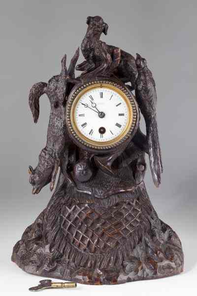 Appraisal: Black Forest Carved Mantel Clock th century well carved with