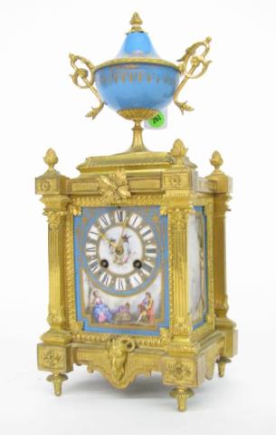 Appraisal: A French style porcelain and gilt mantle clock with scenic