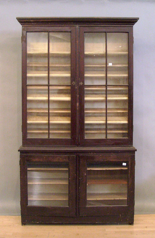 Appraisal: Stained pine two-part bookcase th c h w