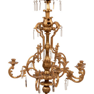 Appraisal: An Austrian Giltwood and Glass Eight-Light Chandelier Circa Height x