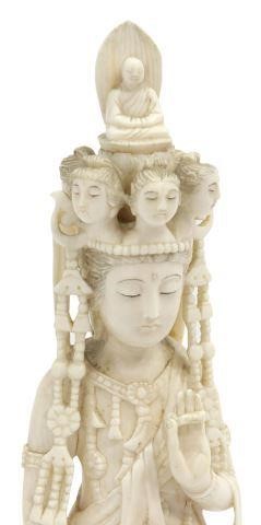 Appraisal: Chinese carved ivory figure of Guanyin th c wearing elaborate