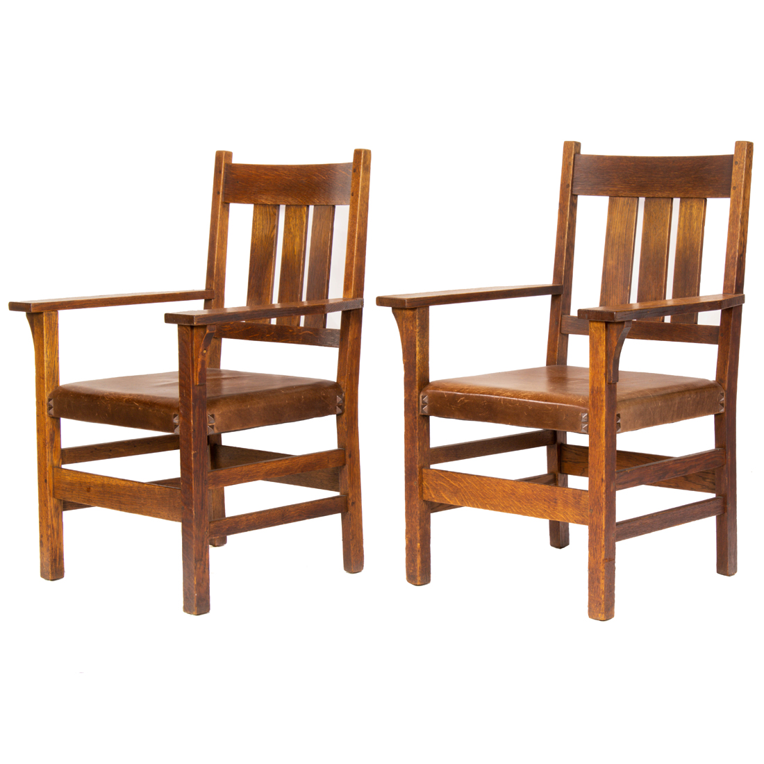 Appraisal: A PAIR OF GUSTAV STICKLEY QUARTERSAWN OAK ARMCHAIRS A pair